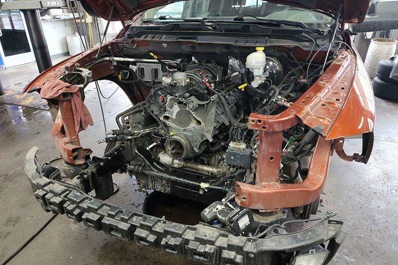 An engine being worked on with the bay open
