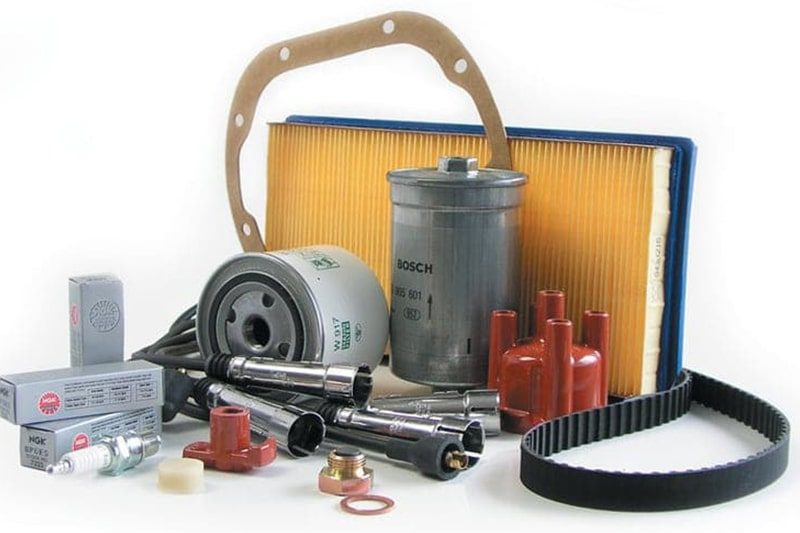 Oil and filter change being carried out on a vehicle lift