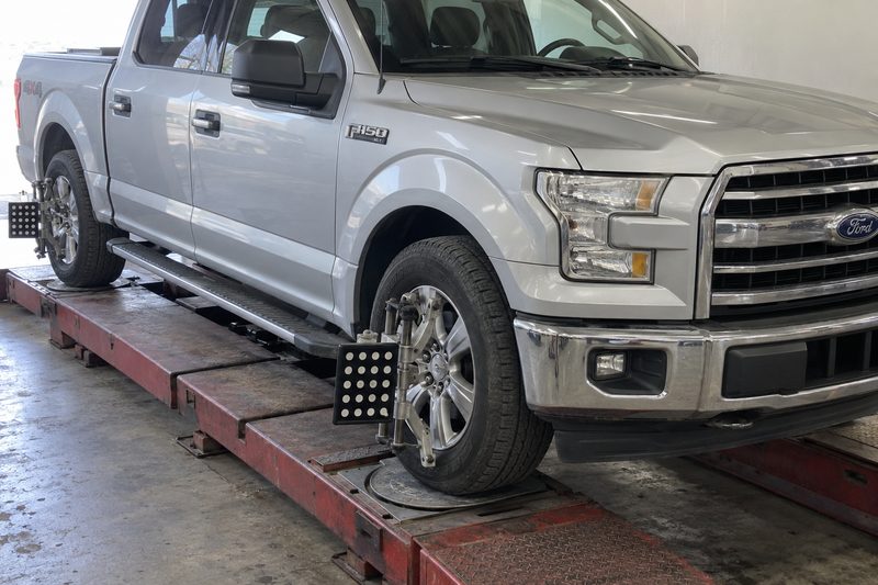 A Ford in the service bay at Dakota Ridge Auto