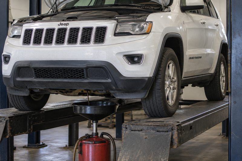 A Jeep in the service bay at Dakota Ridge Auto