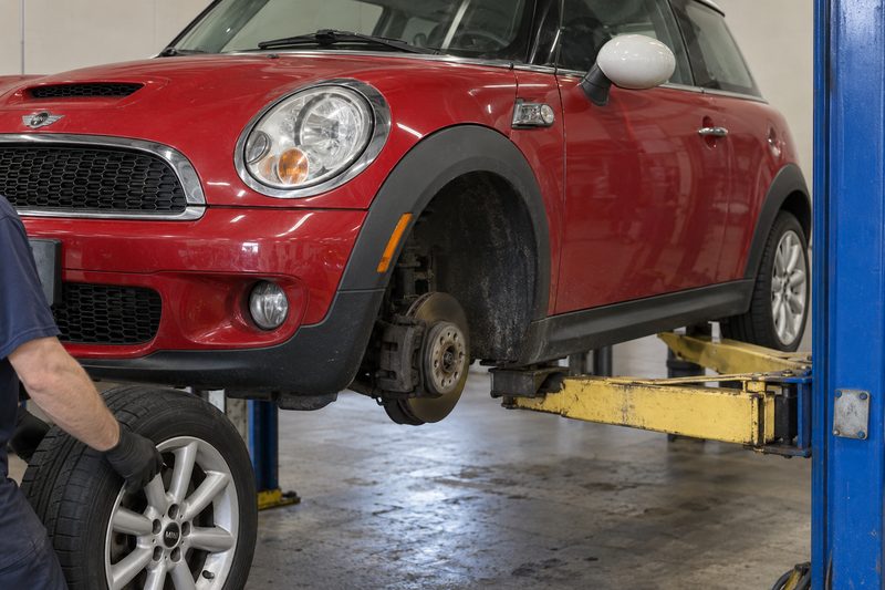 A MINI in the service bay at Dakota Ridge Auto