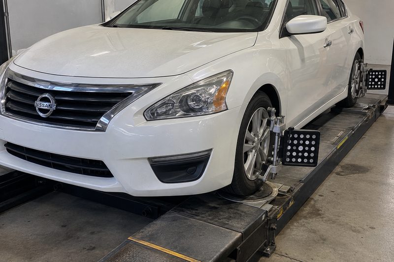 A Nissan in the service bay at Dakota Ridge Auto