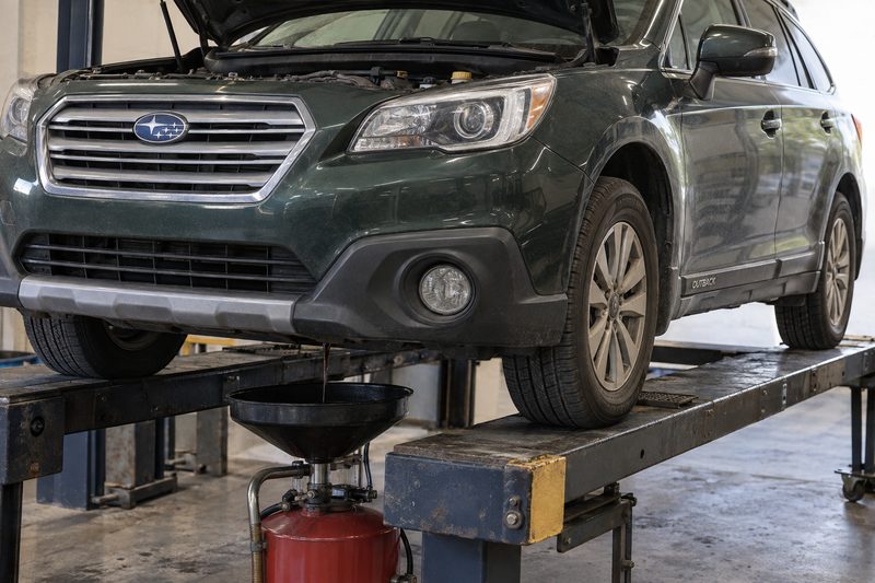 A Subaru in the service bay at Dakota Ridge Auto