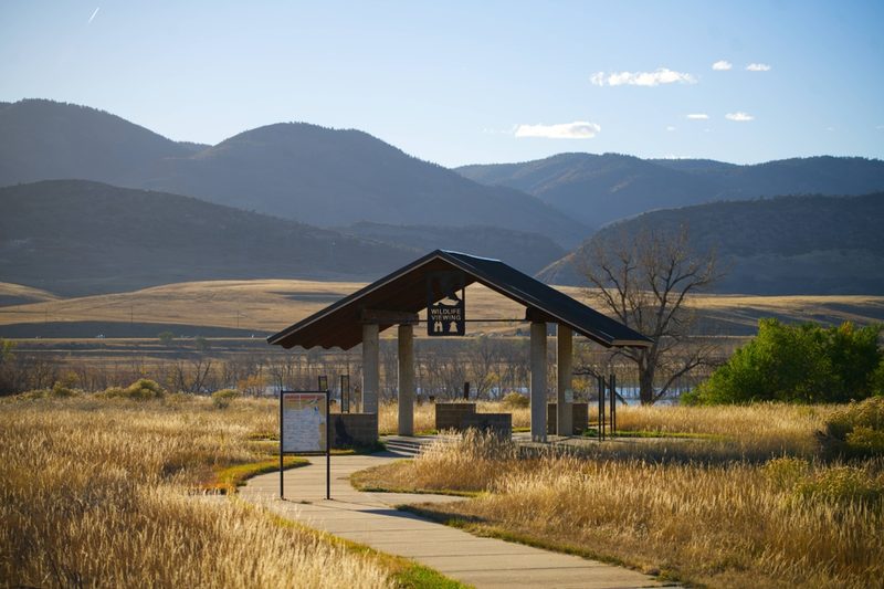 Wildlife viewing shelter at Chatfield State Park with the foothills behind