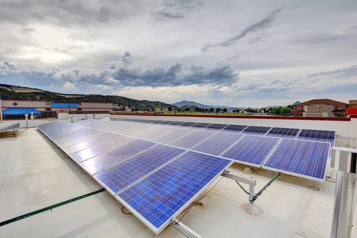The solar array on the roof of Dakota Ridge Auto, looking west toward the hogback